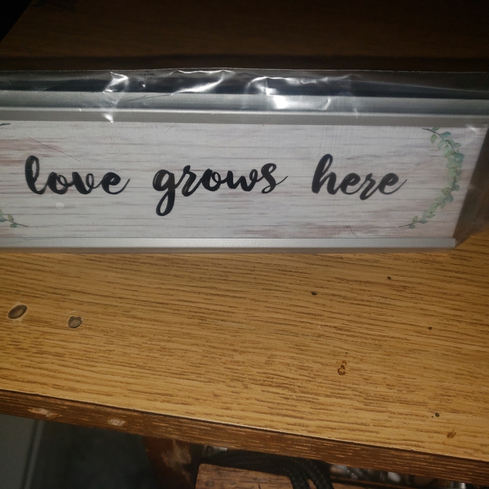 Love Grows Here Desk Plaque